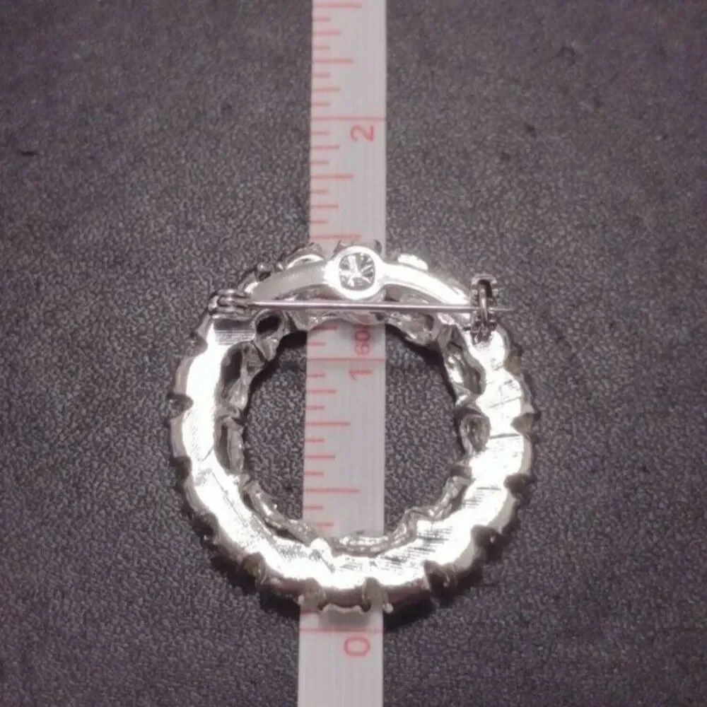 Vintage round rhinestone brooch